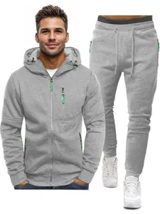 Men's grey hooded zip-up tracksuit set with vibrant neon green zipper accent details