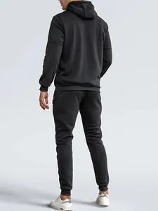 Detailed back view of a men's black hooded sweatshirt and matching sweatpants set