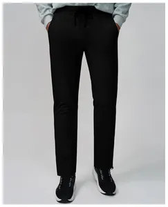 Front view detail of men's quick-dry breathable black sports pants for gym and running