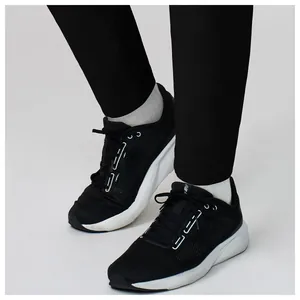 Close-up detail of men's black quick-dry breathable sports pants for running and fitness training
