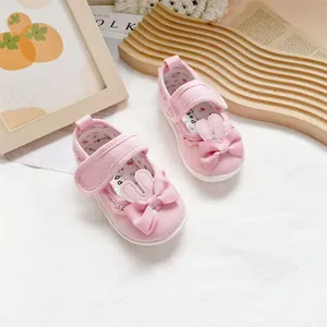 Adorable pink baby girl canvas walking shoes with cute bunny ears and bow accents