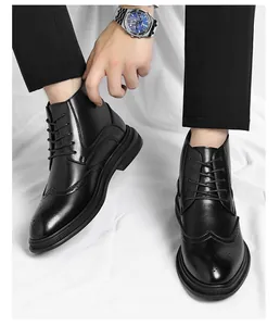 Close-up of stylish black men's Brogue boots featuring classic carved wingtip details