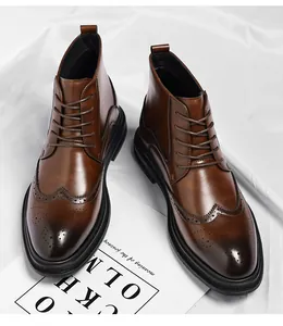 Detailed view of brown leather Martin boots featuring classic brogue wingtip carving