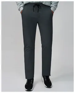 Detail of men's quick-dry breathable running pants with elastic drawstring waist