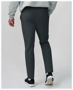 Back view detail of men's charcoal quick-drying breathable athletic pants for running