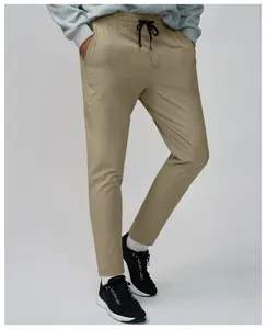 Detailed view of breathable men's quick-dry athletic pants with drawstring waist