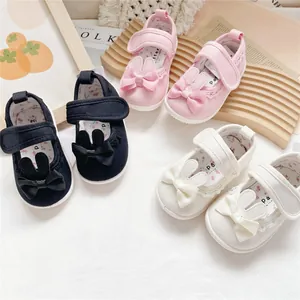 Cute baby girls' toddler canvas shoes with bunny ears and bow accents in multiple colors