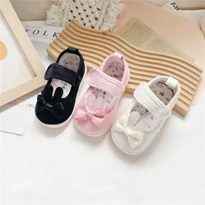 Adorable bunny ear toddler girl walking shoes in black, pink, and white canvas