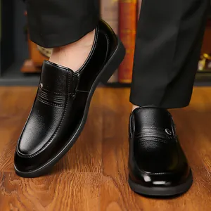 Elegant black textured leather men's business dress shoes in a slip-on style