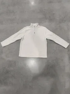 Full flat lay view of a cream men's fleece pullover with quarter-zip neck detail
