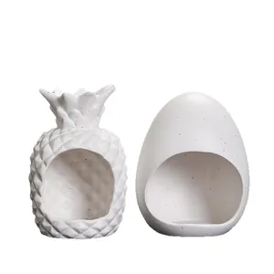 Witte keramische ananas wierookbrander en eierschaalhouder voor Palo Santo houtstand.