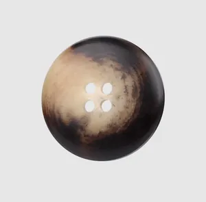 Macro view of a premium resin button with a unique tortoiseshell horn-like texture