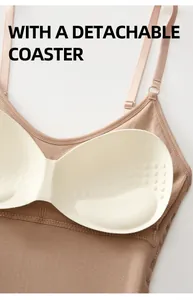 Detailed view of women's shapewear bodysuit featuring a soft detachable bra pad coaster