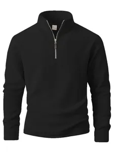 Close-up of men's black polar fleece sweatshirt with silver half-zipper and stand collar.