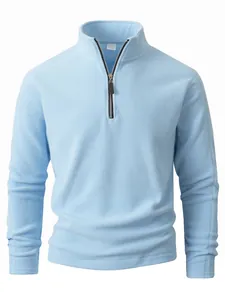 High-quality light blue men's fleece sweatshirt with quarter-zip and stand collar.