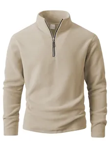 Close-up detail of a men's khaki quarter-zip polar fleece pullover sweatshirt jacket