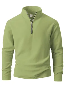 Detail view of men's olive green quarter-zip fleece pullover with stand-up collar