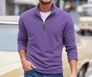 Close-up of purple polar fleece sweatshirt featuring half-zip stand-up collar design