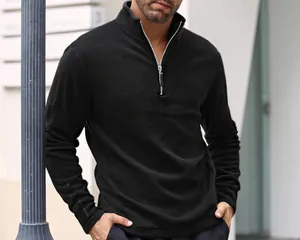 Close-up of black men's heavy fleece half-zip sweatshirt with a sleek stand-up collar design.