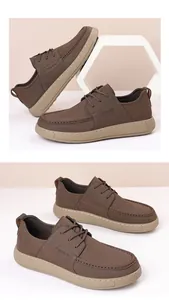 Detailed view of men's brown business casual leather shoes with thick soles