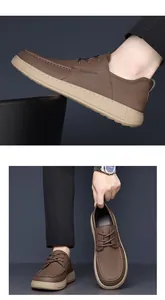 Classic brown men's casual leather shoes with thick soft soles and lace-up design.