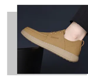 Detail of khaki men's casual leather shoes with thick sole and fashion embossing