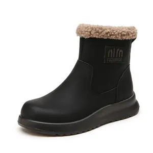 Warm black winter snow boots for women featuring a faux fur collar and durable thick sole