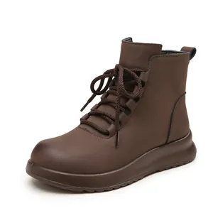 Durable brown leather winter boots for women featuring non-slip soft soles and laces