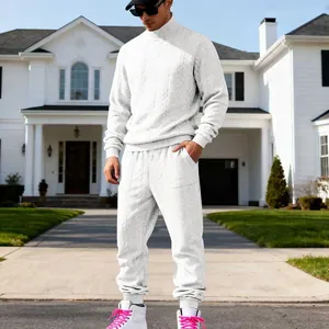 Men's white cable knit tracksuit set with high-neck sweater and joggers for winter style