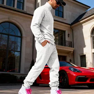 Side view of white heavy jacquard men's tracksuit set with turtleneck and joggers