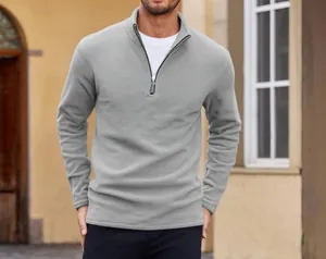 Grey men's polar fleece half-zip sweatshirt with stand collar outdoors
