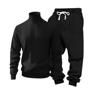 Detailed texture of men's black cable knit turtleneck sweater and matching jogger set