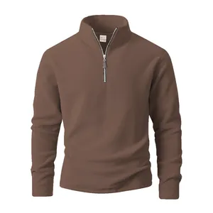 Brown men's half-zip polar fleece sweatshirt with stand collar and long sleeves.