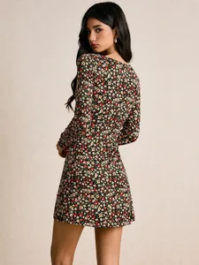 Detailed back view of a romantic vintage floral long-sleeve mini dress with a slim fit design