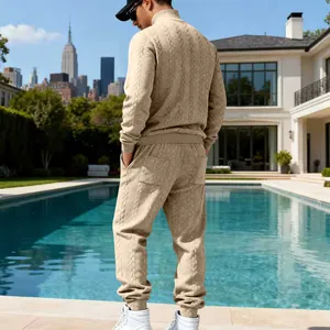 Back view of men's beige cable knit tracksuit set featuring mock neck sweater and joggers