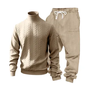 Close-up of men's beige heavyweight cable knit turtleneck sweater and jogger set