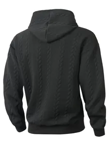 Back view of black men's hoodie featuring cable knit textured pattern and hood.