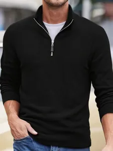 Stylish men's black fleece sweatshirt featuring half-zip stand collar and long sleeves