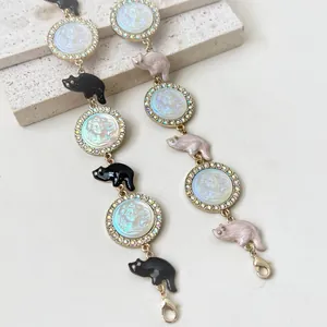 Elegant relief female head necklace with colorful resin rhinestones and cat charms.
