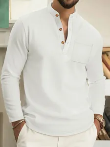 Detailed view of white waffle knit Henley shirt with buttons and chest pocket