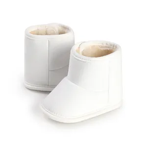 Soft white winter boots for babies featuring warm faux fur lining and anti-slip soft soles