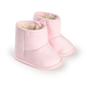 Warm pink baby snow boots with fluffy lining and soft sole for newborns.