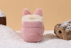 Detailed back view of pink kids winter snow boots with cute fuzzy ears and warm lining