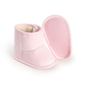 Pink infant winter boots with fleece lining and anti-slip soft sole for newborns.