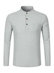 Close-up of light grey waffle knit Henley shirt showing buttoned collar and texture