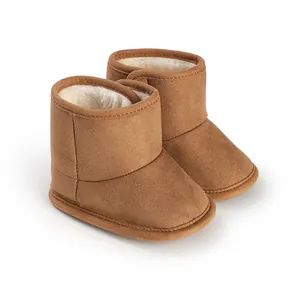 Cozy brown infant winter boots with soft fleece lining and easy velcro closure.