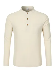 Detail view of men's long-sleeved Henley shirt with waffle texture and pocket