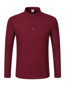 Close-up of a burgundy waffle-knit men's Henley shirt with three buttons and a pocket