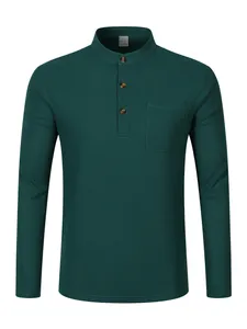 Front view of dark green long sleeve Henley shirt with waffle texture and chest pocket