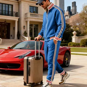 Close-up of men's blue heavyweight stand collar tracksuit with side stripe details